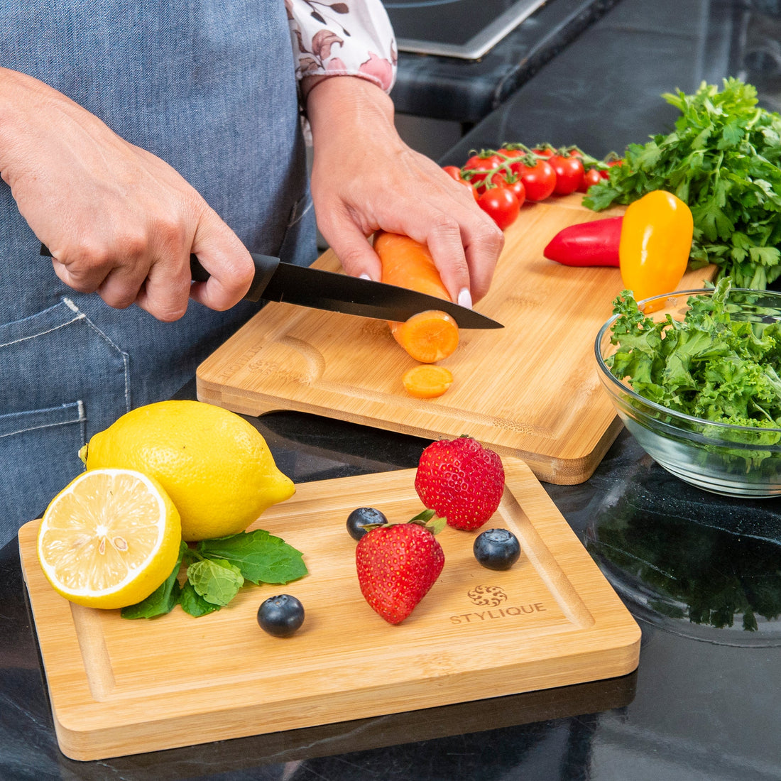 STYLIQUE bamboo chopping board in use on a benchtop